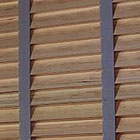 Cloth tapes are both functional and stylish; a great way to further customize your wood blinds. Cloth tapes replace the standard ladder cords, covering the route holes, blocking out any light that would filter through and providing additional privacy and light control. They are also a decorative option, giving you a way to match or contrast the wood blind color or your decor color.